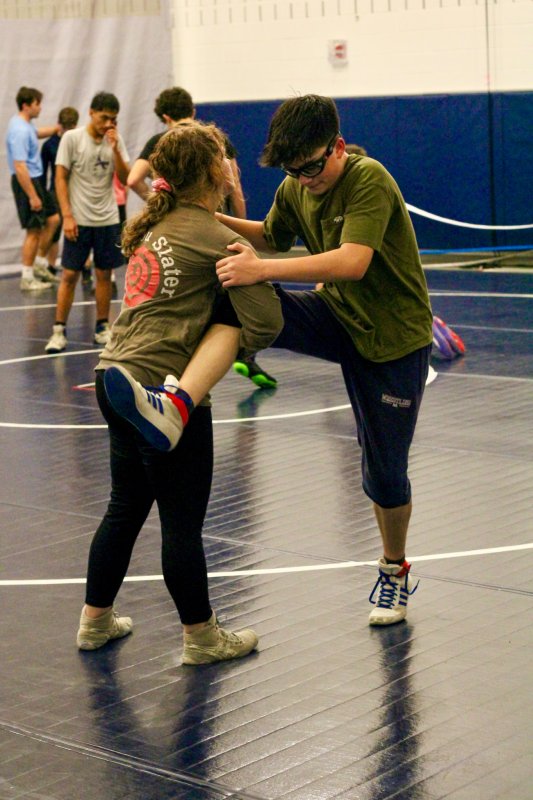 Senior Talah Patton takes control of Joel Denham’s leg.