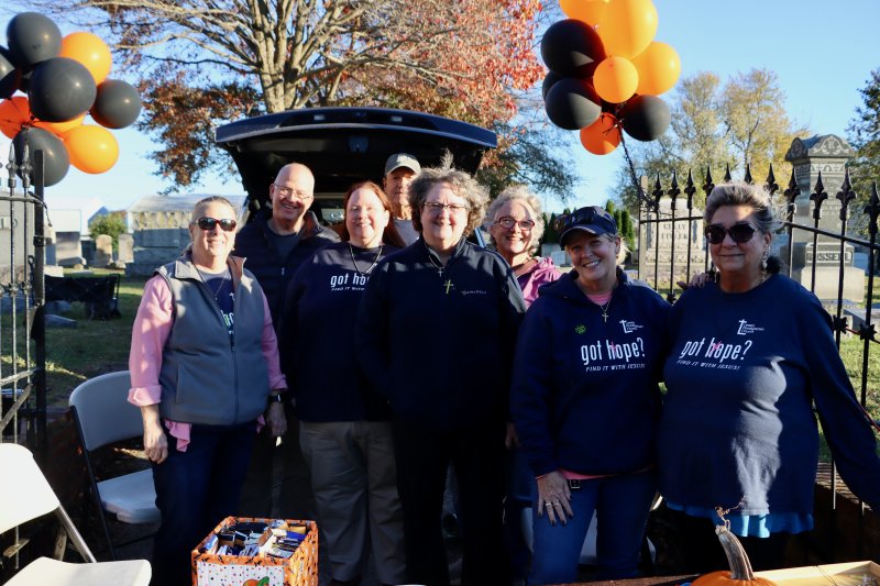 Lewes Presbyterian Church on Kings Highway takes advantage of trick-or-treat night to host its first Holy-ween. Church members gave out full-size candy bars and other treats with Bible versus written on them. Shown are (l-r) Nancy Williams, the Rev. Greg Wiest, Cheryl Morgan, Jeff Williams, Sue Ellen Radhe, Laura Wiest, Dawn Hurd and SherryLee Biele.