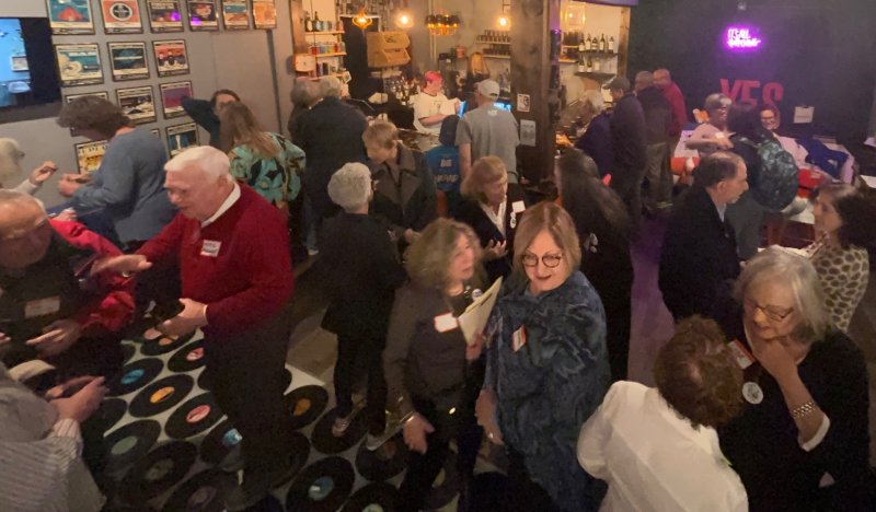 Speak Out Against Hate supporters mingle and bid on auction items at the dance party fundraiser. SUBMITTED PHOTO