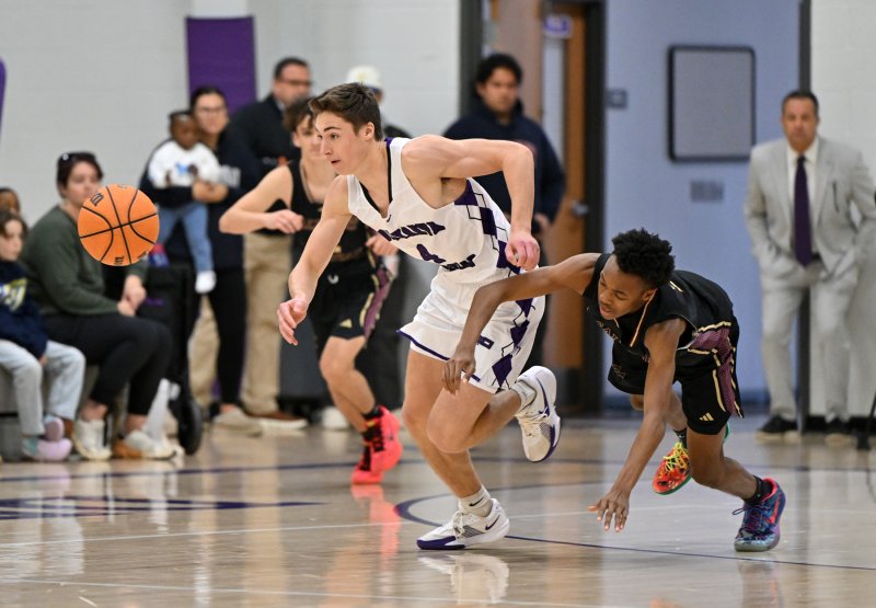 Royals forward Landon Jackson gets one of his four steals. DAN COOK PHOTOS