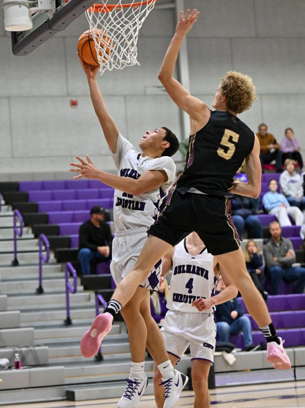 Royals freshman guard Aarian Tucker goes in for two of his 18 points.