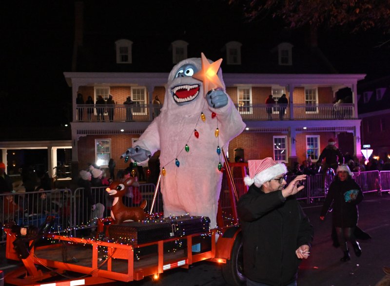 A friendly Yeti waves to the crowd.