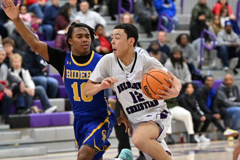 Freshman guard Aarian Tucker drives to the hoop for the Royals.