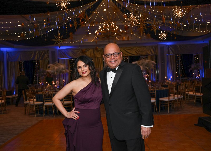 Pausing for a photo before the crowd arrives are Neepa Jani and Dr. Uday Jani,