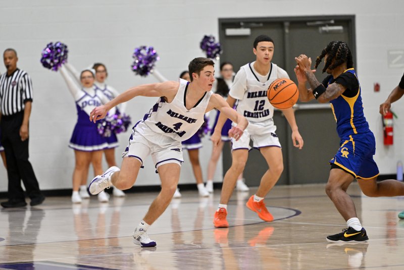 Royals junior Landon Jackson makes a steal in the third quarter.