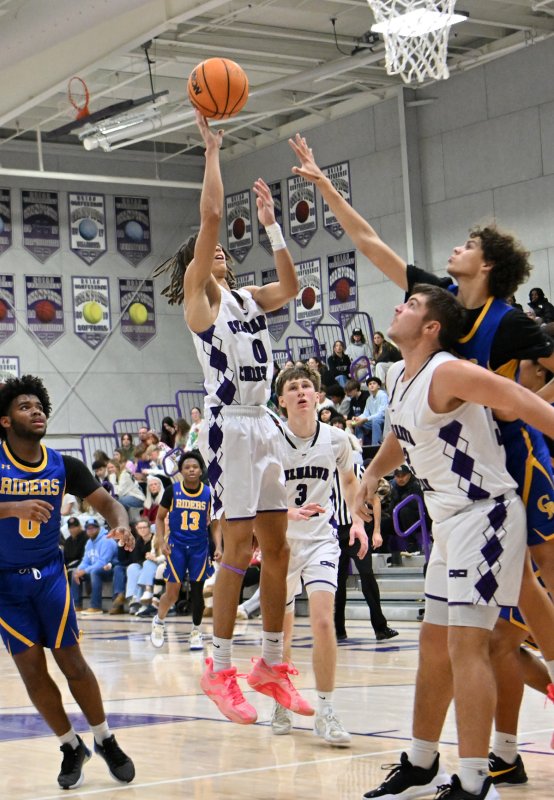 Royals senior Seth Mifflin takes a shot in the paint.