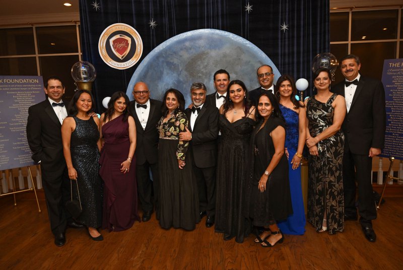 The Harry K Christmas Gala was a successful fundraiser to fight childhood hunger in Delaware. Harry Keswani family and friends shown at the event are (l-r) Dr. Joydeep Haldar, Dr. Maria Haldar, Neepa Jani, Dr. Uday Jani, Sonia Keswani, Harry Keswani, Sanjay Kapuria, Anjali Keswani, Kajal Kapuria, Dr. Manu Sehgal, Dr. Shalini Sehgal, Dr. Reetu Singh and Dr. Vikas Batra. DAN COOK PHOTOS