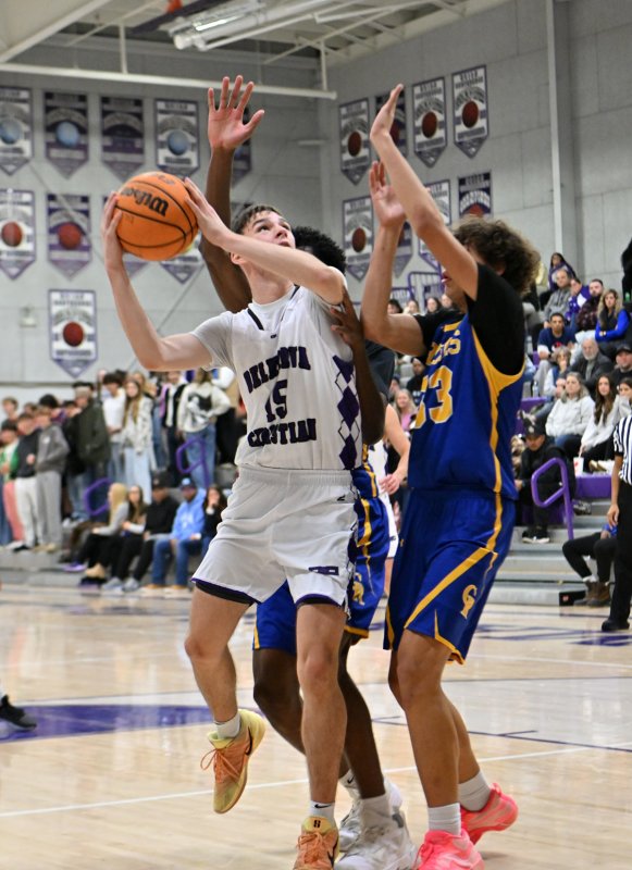 Royals senior Gideon Woods goes up strong in the paint.