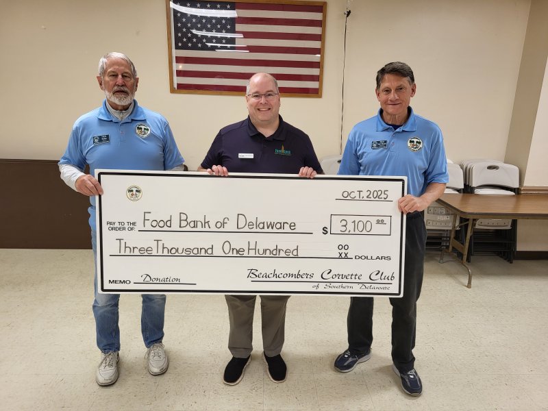 Check presentation attendees shown are (l-r) Hank Selke, Beachcombers Corvette Club president; Chad Robinson, Food Bank of Delaware vice president of external affairs; and Dave Van Stone, club vice president. SUBMITTED PHOTO