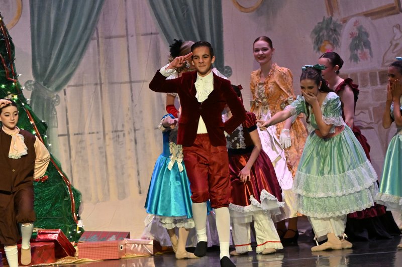 Fritz portrayed by Lincoln Fyock, 13, of Lewes dances in the party scene.
