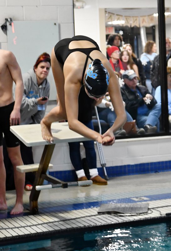 Alysa McCarthy leaves the blocks in the 100 freestyle.