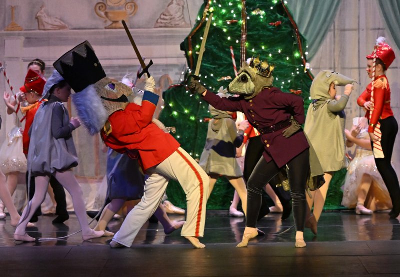 The Nutcracker, portrayed by Lannah O’Day, battles the Mouse King, portrayed by Emma Randazzo.