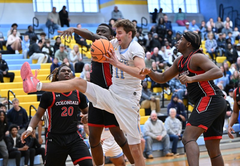 Cape senior Braxton Figgs snags a rebound for the Vikings.