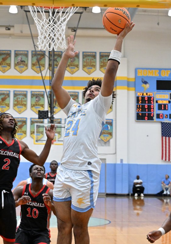 Cape senior Dell Richards goes up strong for a deuce.