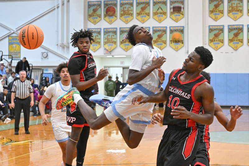 Junior guard Stephen Sivels gets fouled going to the hole.
