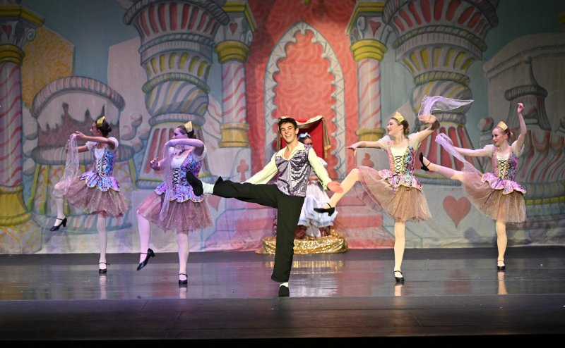 Lincoln Fyock leads the Russian Trepak dance.