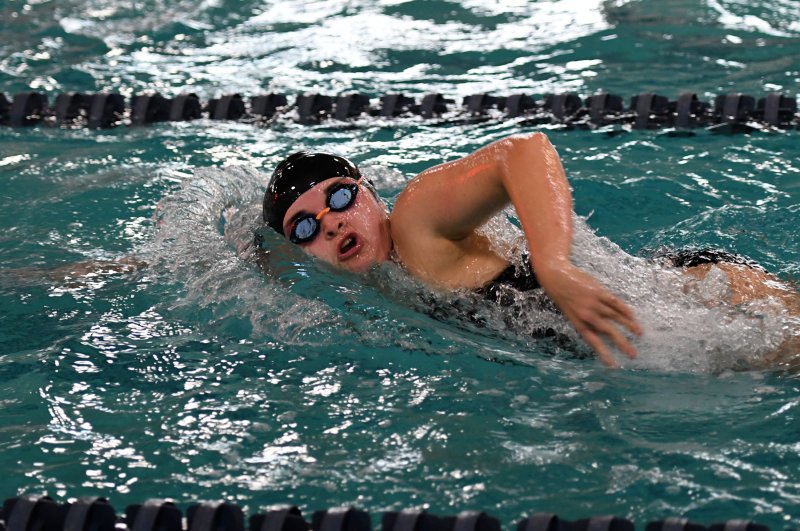 Junior Taylor Thomson swims the 200 freestyle for the Vikings.