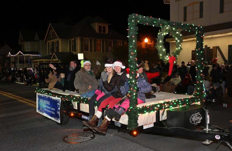 Milton Mayor John Collier and others from the town’s government ride their float.