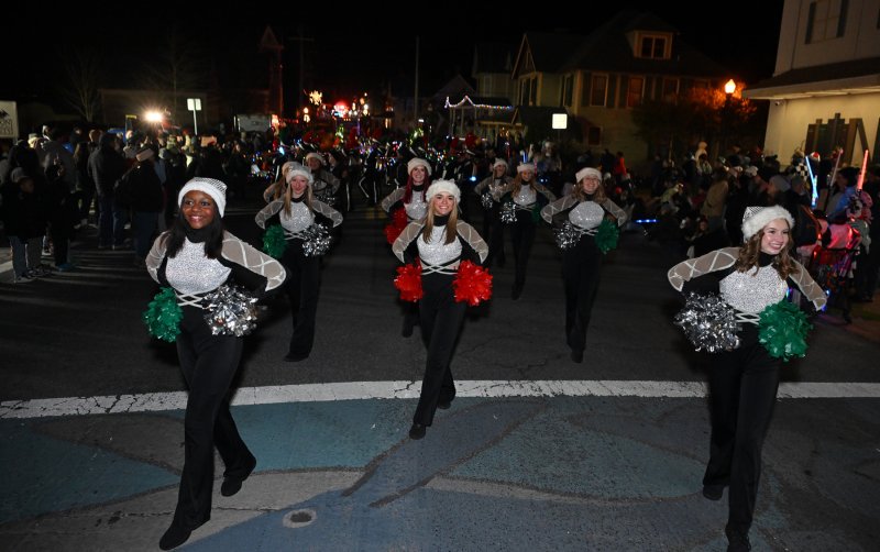 The Sussex Tech dance troupe leads the Ravens band.