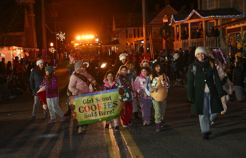 The Girl Scouts promote their cookies.