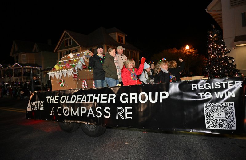 The Oldfather Group waves to the crowd.