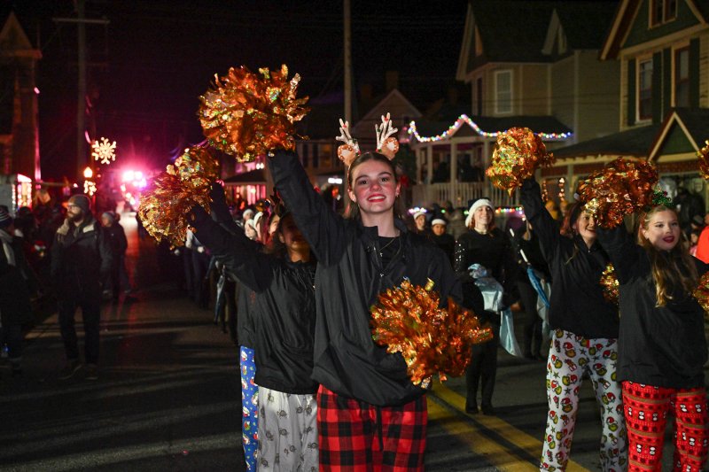 Cape dance troop member Marley Fyock entertains the judges with the Cape band.