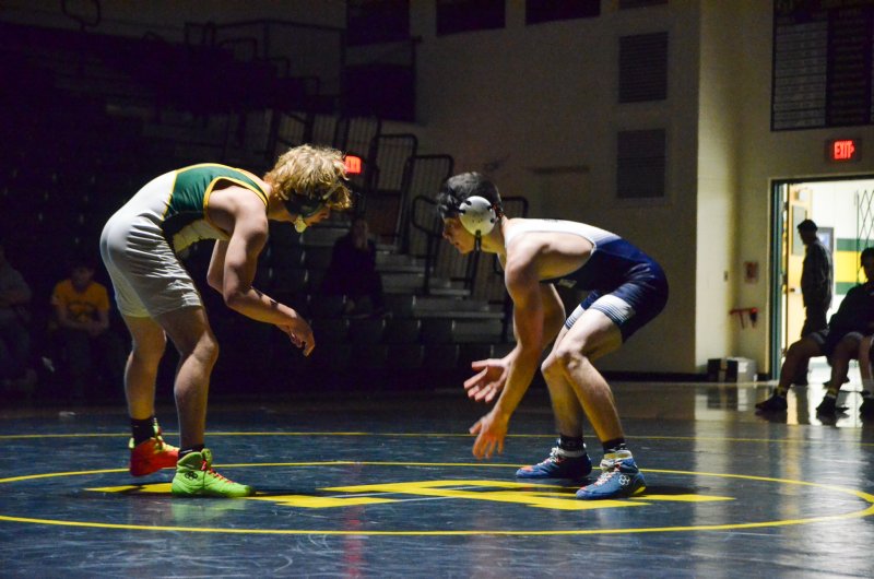 Sussex Academy senior Ryan Buckler squares up against Blake Whittington at the start of his 4-1 victory in the 132-pound bout during the Seahawks’ 74-3 loss to Indian River Dec. 18. AARON R. MUSHRUSH PHOTOS