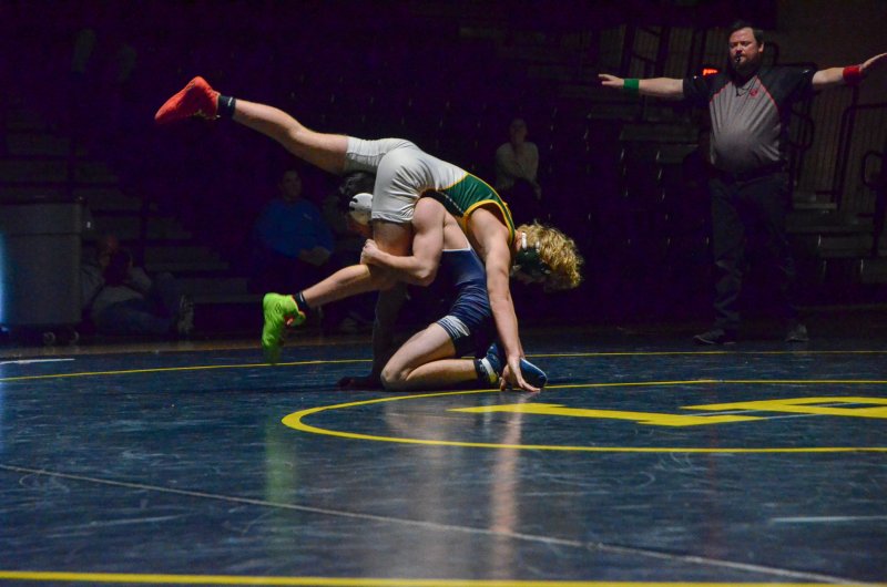 Sussex Academy senior Ryan Buckler and Blake Whittington, along with the safe sign from the ref, play out a sequence that could be seen on the diamonds.