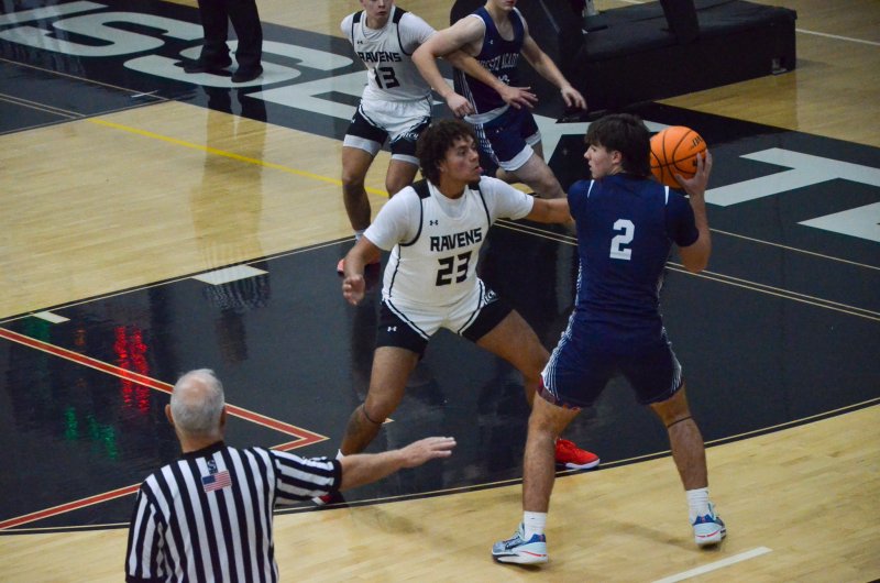 Sussex Academy sophomore Mason Glover is sized up by Sussex Tech senior Malachi Simmons.