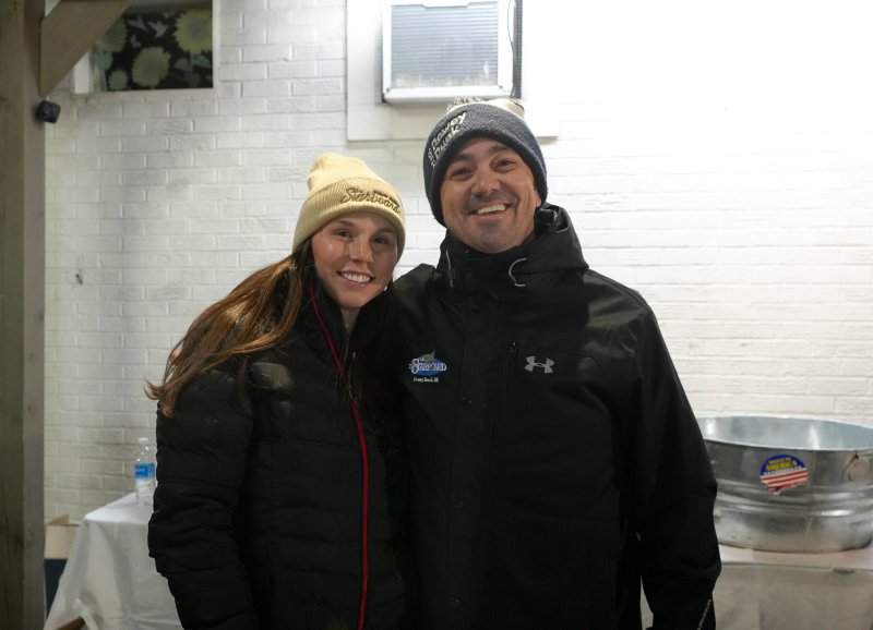 The Starboard’s Dylan Scerri, left, and Doug Moore are ready to serve drinks to people at the Fifer’s tree lighting.