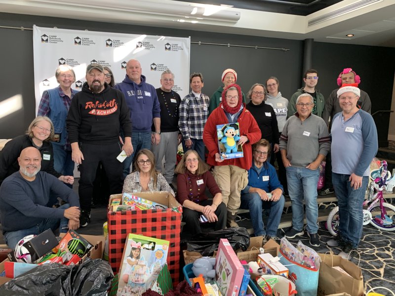 Community volunteers gathered to sort donated toys and winter clothing items are in back are (l-r) Cathy Balsley, Elizabeth Powell, Joe Vescio, Steve Scheffer, Maria Scannapieco, Barbara Ralph, Linda Tiano, Kate Frampton. Holden Umanzor and Julio Umanzor. In the middle are Lee Whitehead, Margaret Tobin, Anthony Delacruz and Paul Christensen. In front are Maureen McGeough, William Gestole, Linda Szabo, Daphne Kaplan and Francine Siedlecki. SUBMITTED PHOTO