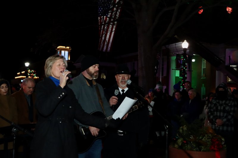 A musical selection is performed by (l-r) Lori Lee, Jason Lee and Sussex County Sheriff Robert Lee.