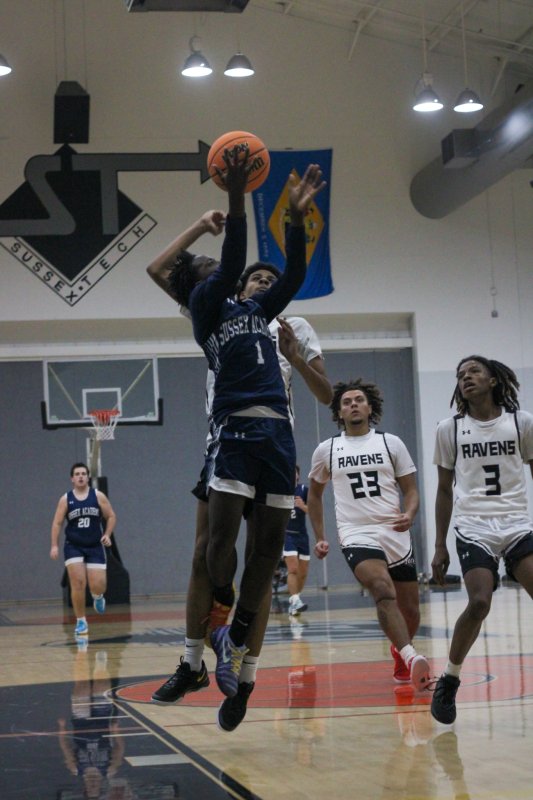 Sussex Academy sophomore Farmar Amisial finishes inside.