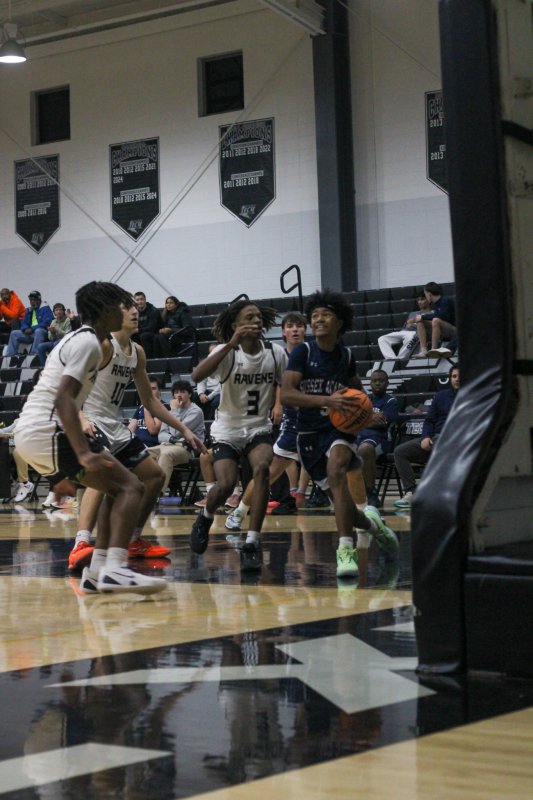 Seahawks sophomore Rico Nock begins to elevate at the baseline.