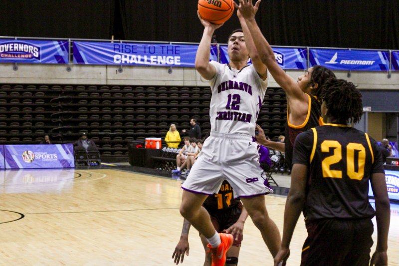 Delmarva Christian freshman Aarian Tucker works through some bodies in the paint in the second quarter of the Royals’ 60-53 victory over Washington (Md.) in the opening game of the Governor’s Challenge at the Wicomico Civic Center in Salisbury, Md. AARON R. MUSHRUSH PHOTOS