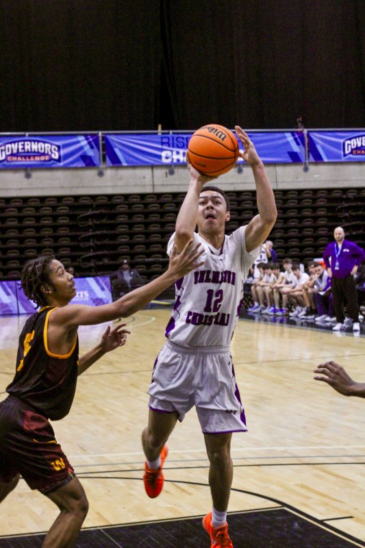 Delmarva Christian freshman Aarian Tucker shoots close.