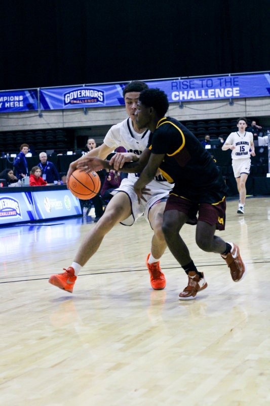 Royals freshman Aarian Tucker goes behind the back.