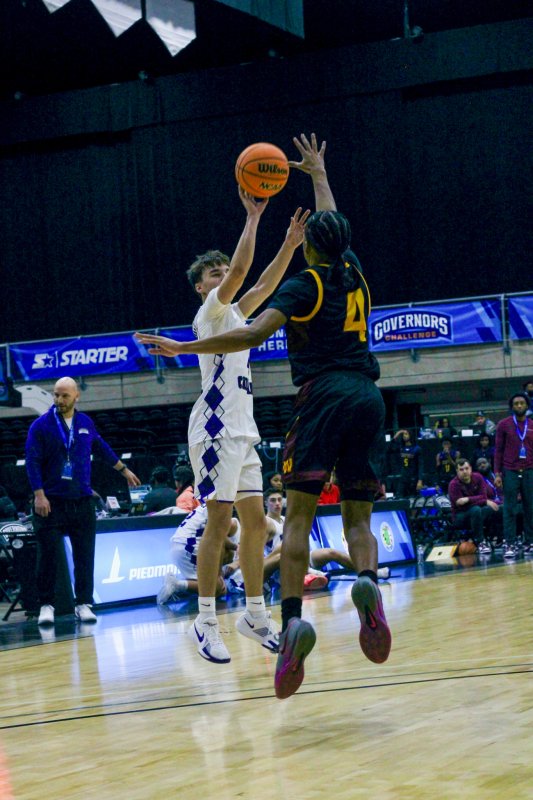 Delmarva Christian sophomore Asher Woods throws one up from downtown.