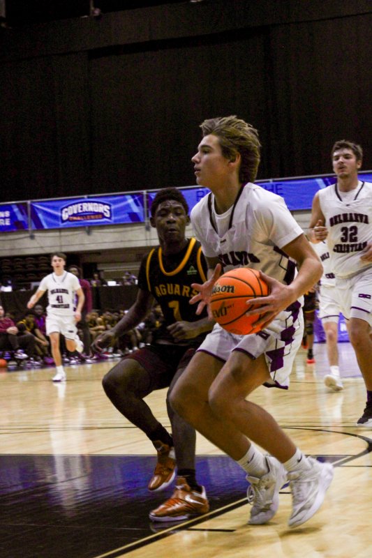 Royals junior Josh LoRusso finishes off a fast break.