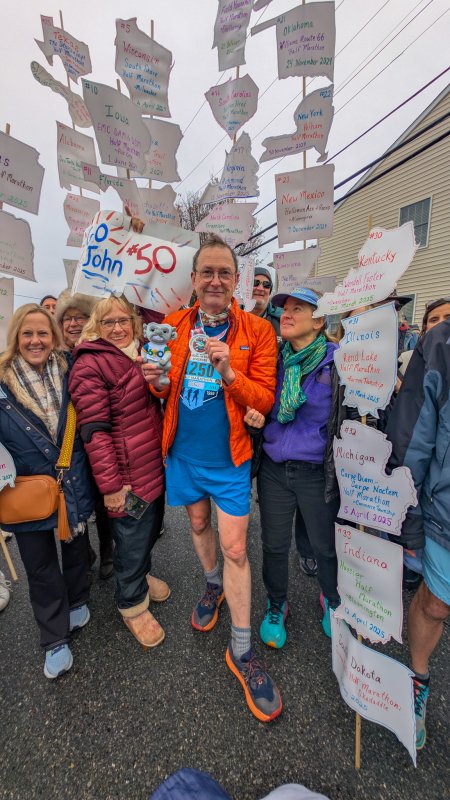 John Newsam’s family held signs featuring all 50 states.