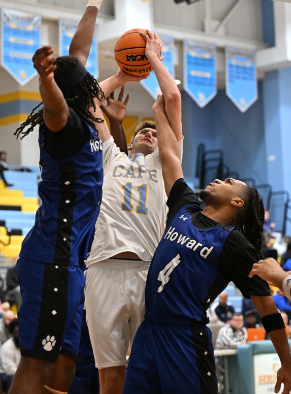Cape senior Braxton Figgs gets fouled under the boards.