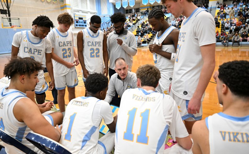 Cape head coach Steve Re rallies his players in the third period.