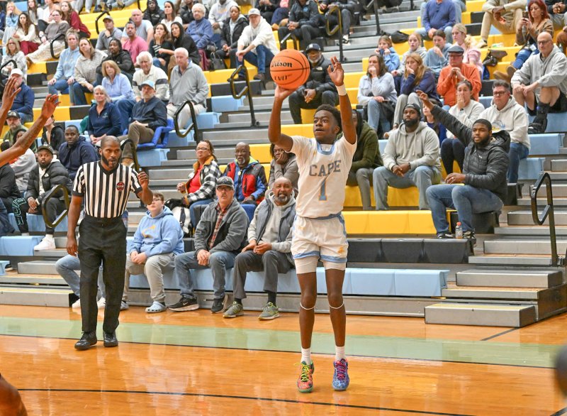 Cape junior point guard Stephen Sivels hits a three on a Jameson Tingle feed to send the game into overtime. DAN COOK PHOTOS