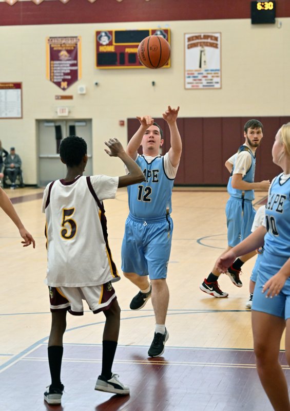 Cape sophomore Zackary Valles shoots over Milford’s Kenneth Deputy.