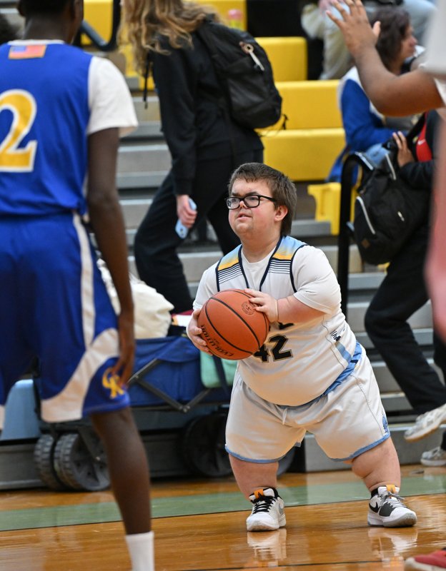 Cape sophomore Norman Rust goes triple threat before a shot.