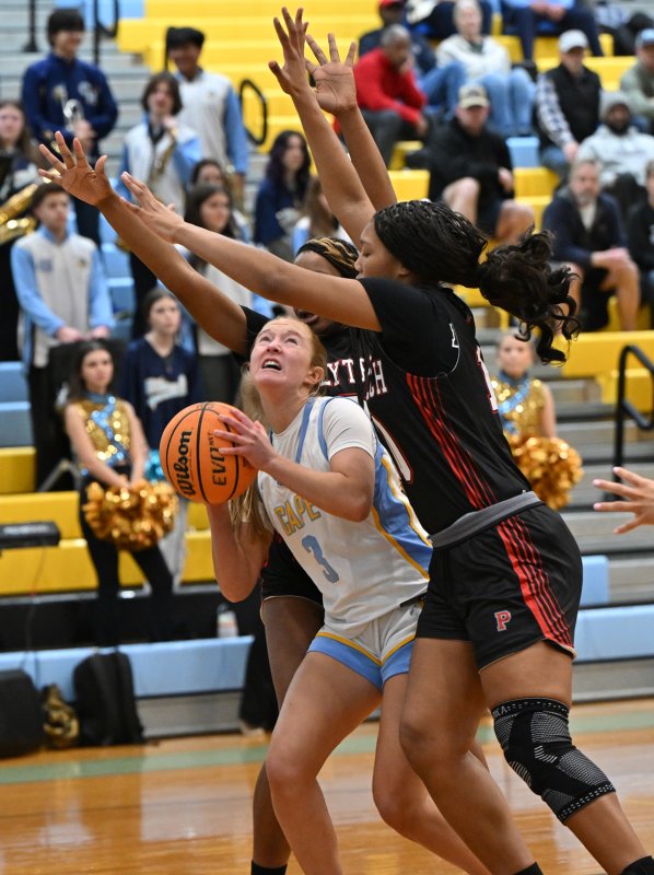 Mairead Rishko looks to take on the defense down low and picks up the foul.