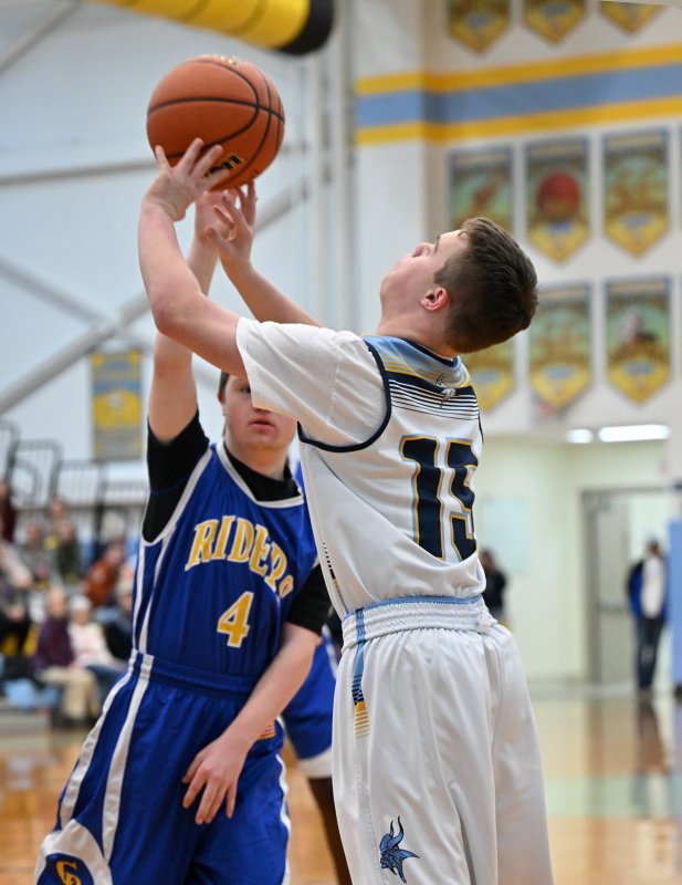 Sophomore guard Luke Archer takes a shot for the Vikings.