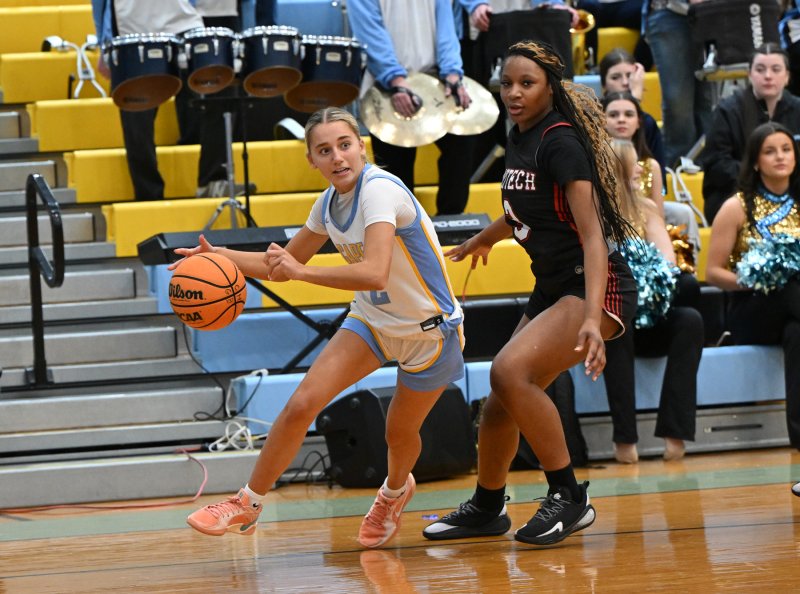 Cape sophomore guard Mikaela Gordon drives baseline around Polytech’s Breechley Chery.