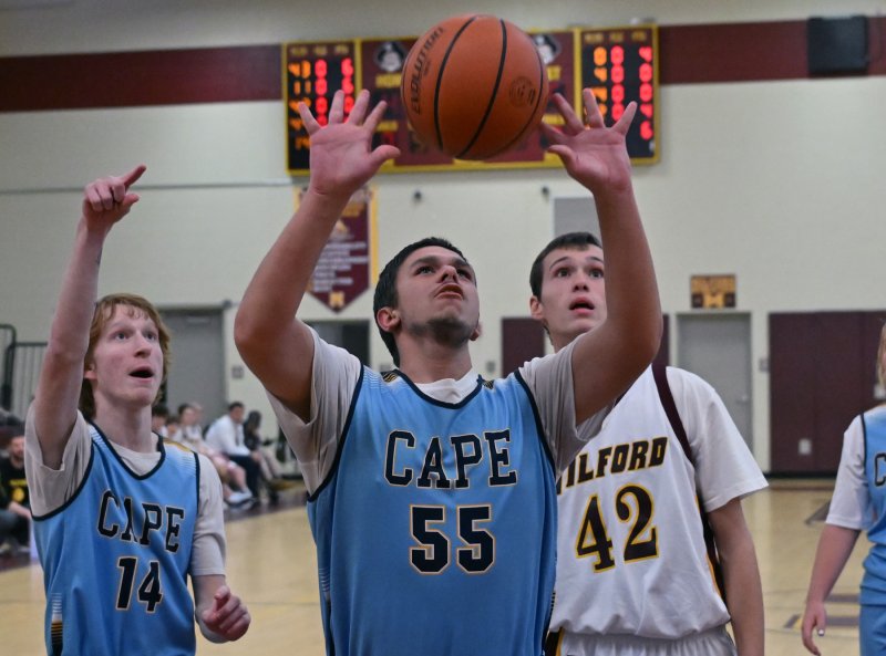 Cape’s Austin Hastings hits a shot with a verbal assist from unified partner Bennett Steinmann.