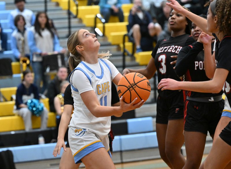 Senior Maya Yngve goes up underneath and is fouled.